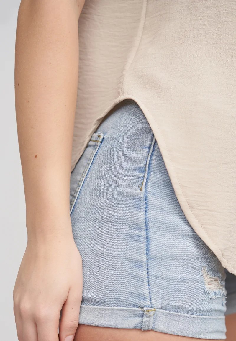 Sleeveless Button-Up Blouse - Image 17