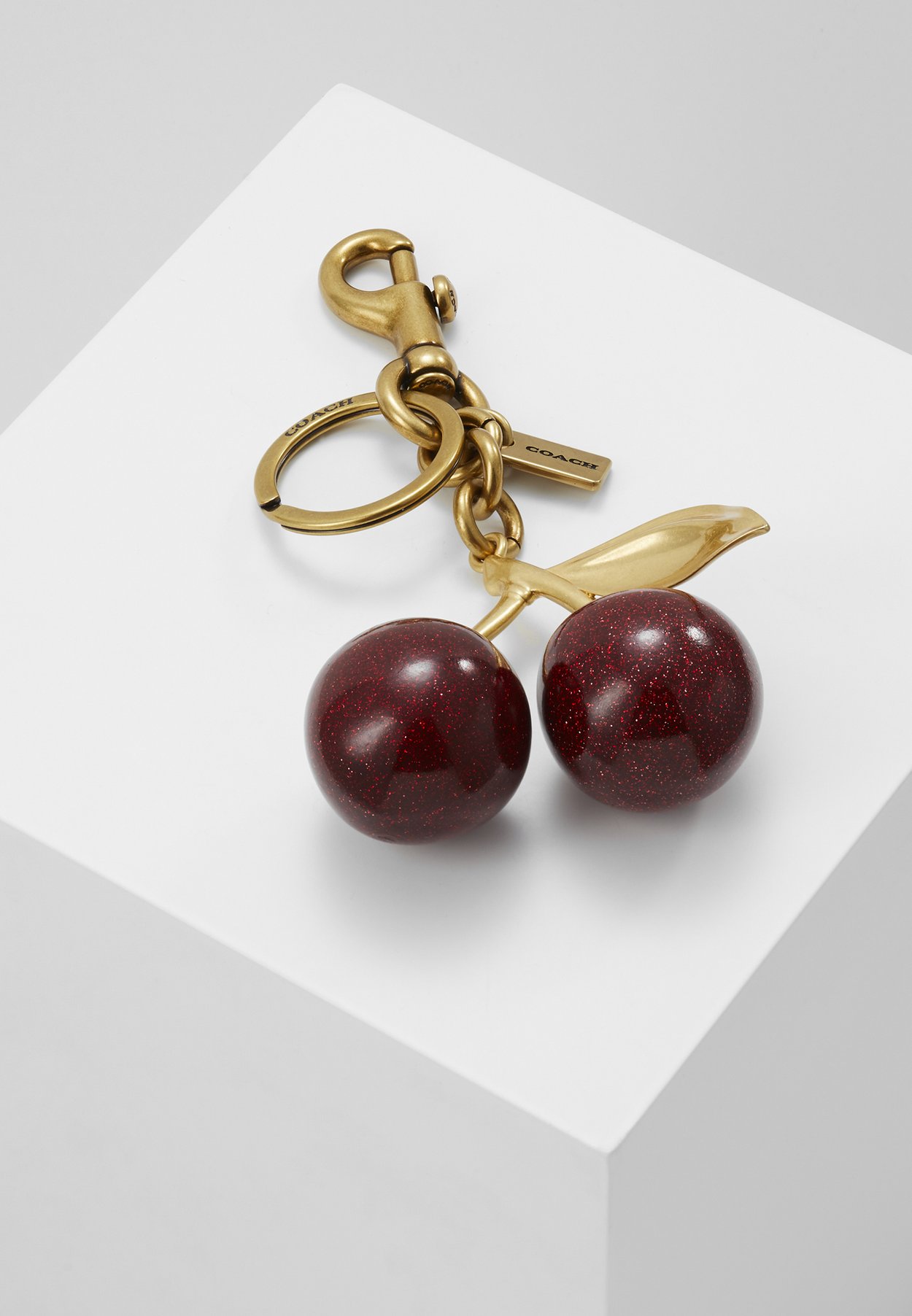 COACH CHERRY BAG CHARM - Keyring - red